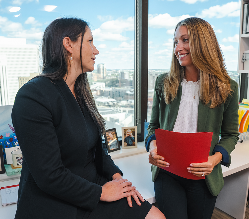 Two attorneys having an conversation.